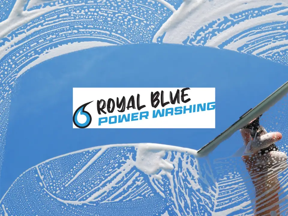 royal blue power washing cleaning a window kansas city mo