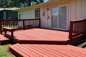 This is a photo of a deck that was washed and stained in Kansas City, KS, by Royal Blue Power Washing in Kansas City, MO.